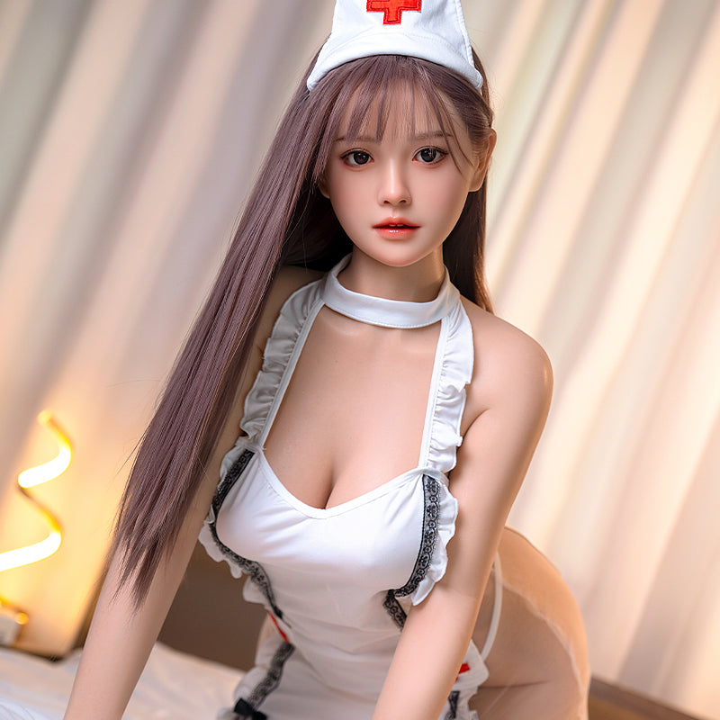 Karin, a nurse in uniform, Asian, with long hair, full breasts, and a full-body silicone sex doll.