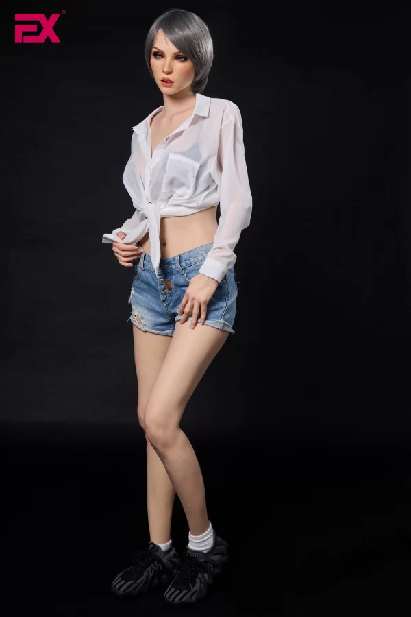 Scarlett, a mature, gray-haired, large-breasted silicone sex doll.