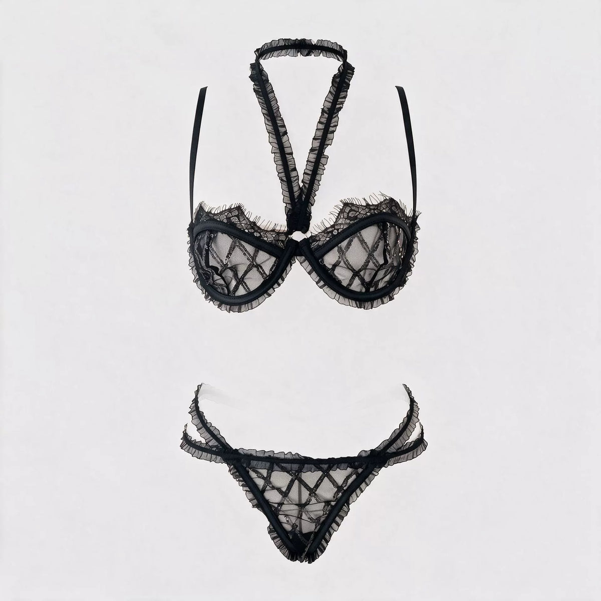 New French-style sexy lingerie set featuring a geometric grid-patterned mesh bra with sequin detailing and lettuce-edge trim, designed to minimize the appearance of a larger bust.