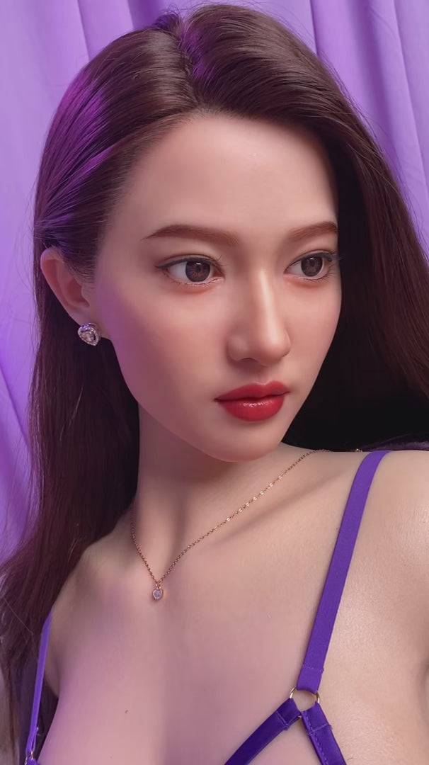 Jia Chen, Asian, wearing a sexy purple and silver nightgown, a full-body silicone sex doll.