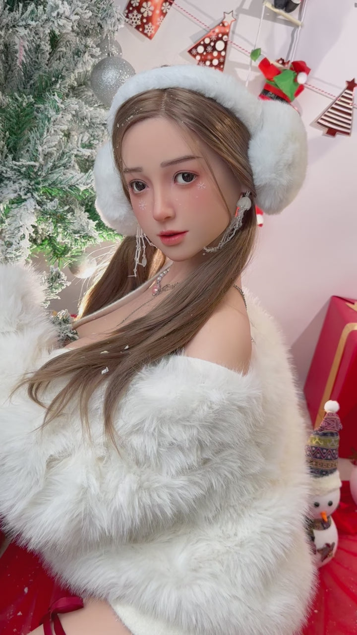 Hanazawa, an Asian woman with long hair, large breasts, and a full-body silicone sex doll.